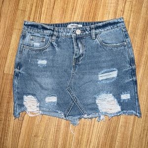 Distressed denim skirt